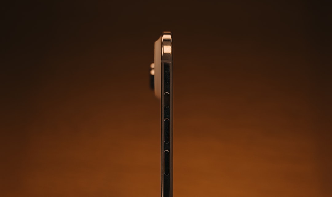 Side view of a modern smartphone with camera