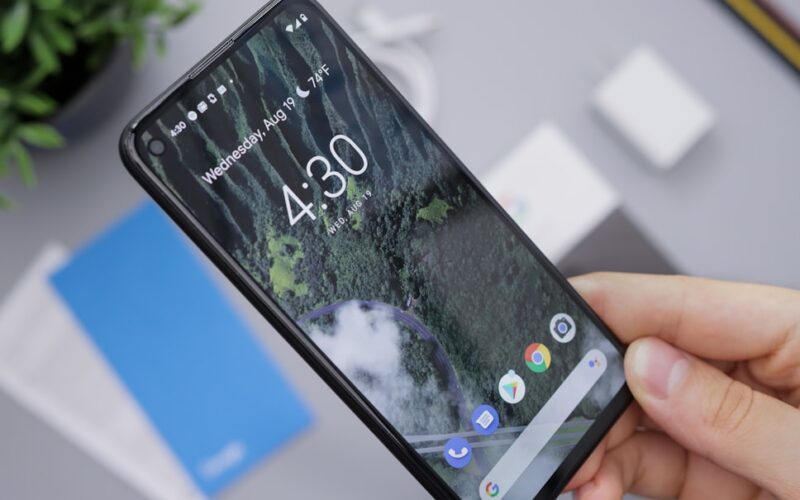 person holding black android smartphone