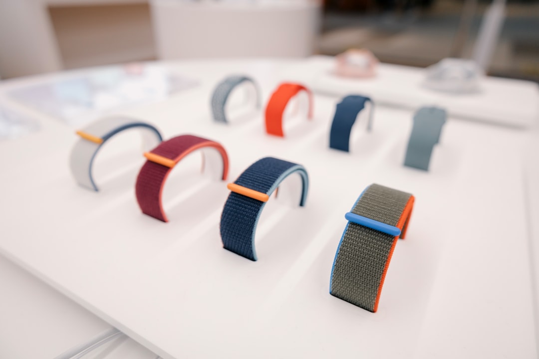 a bunch of different colored bands on a table