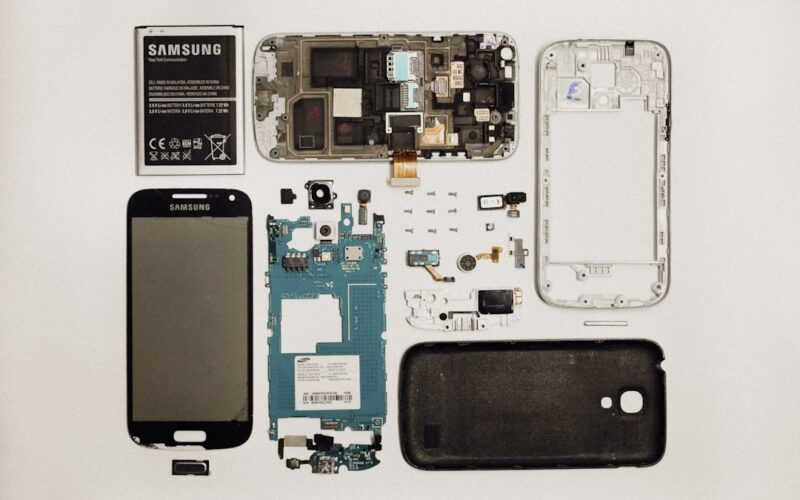 a picture of a cell phone and parts