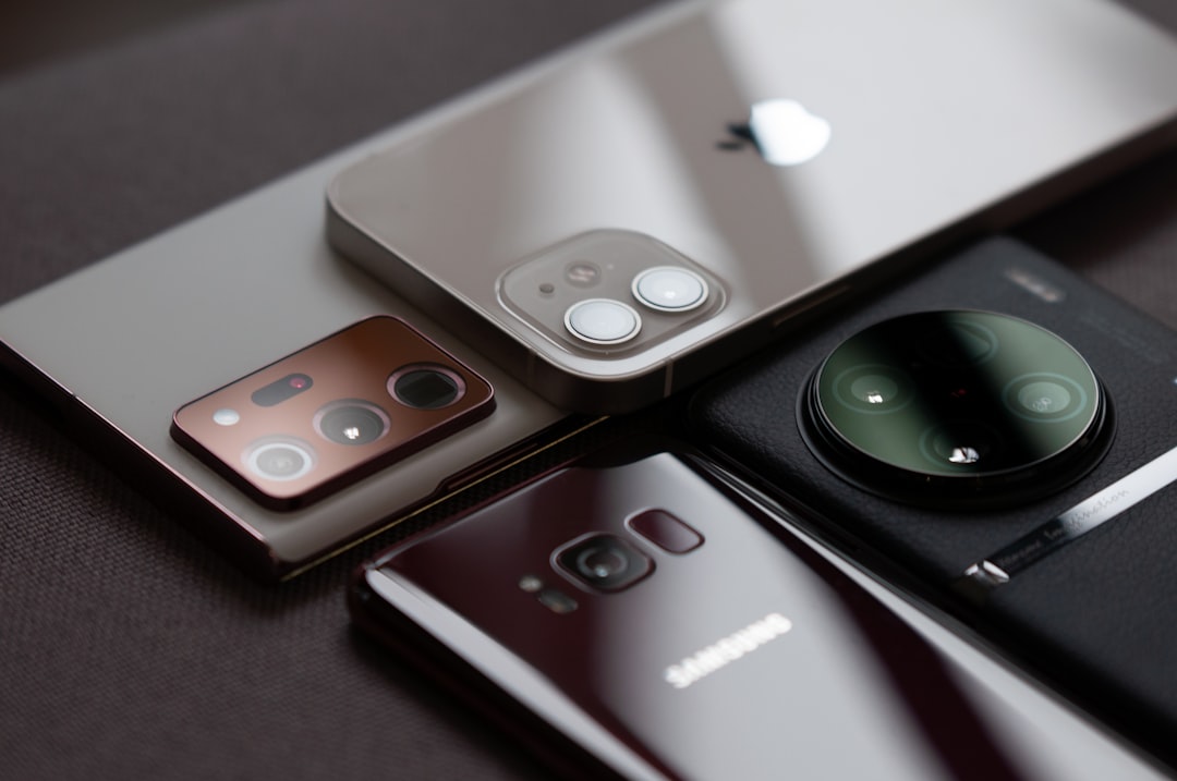 a group of cell phones sitting on top of a table