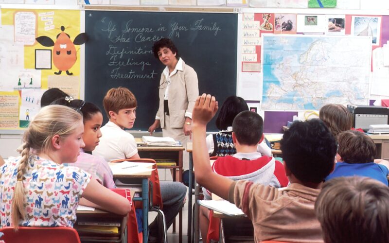 Classroom ai restrictions — woman standing in front of children