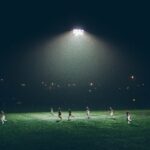 American spectacle global sports — group of people playing soccer on soccer field