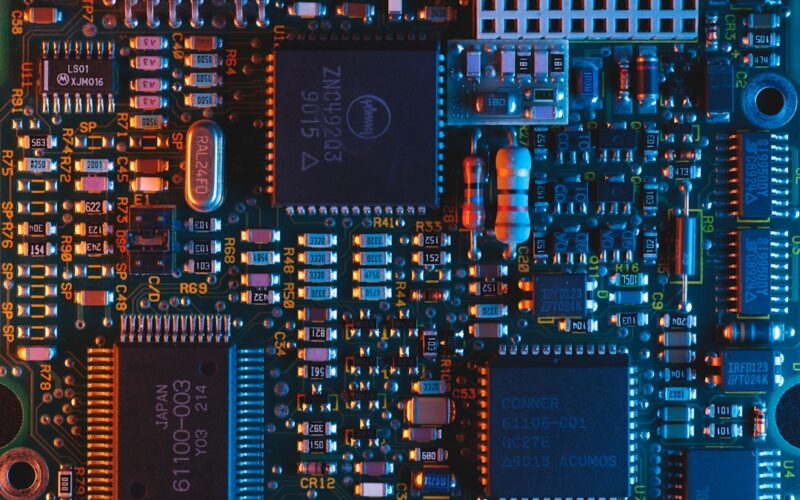 Chip workers — blue circuit board
