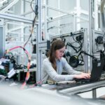 Chip bans semiconductor independence — woman in white long sleeve shirt using black laptop computer