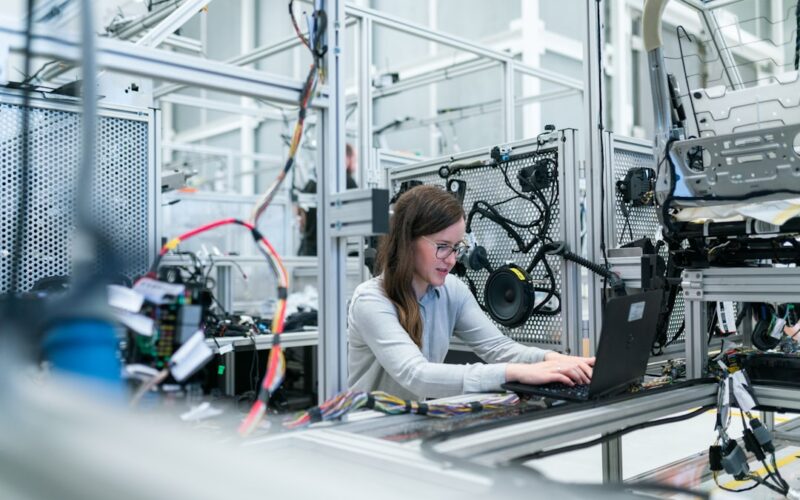 Chip bans semiconductor independence — woman in white long sleeve shirt using black laptop computer