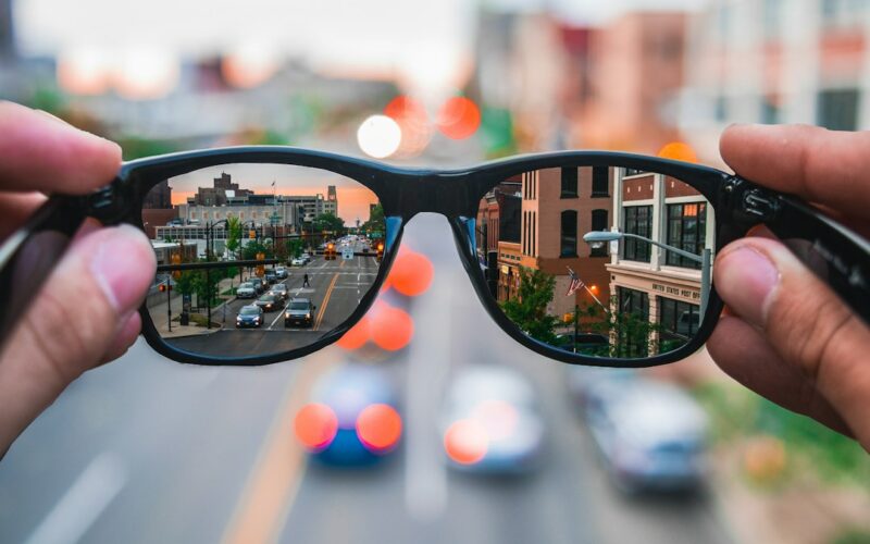 Smart glasses privacy — sunglasses highway reflection during day